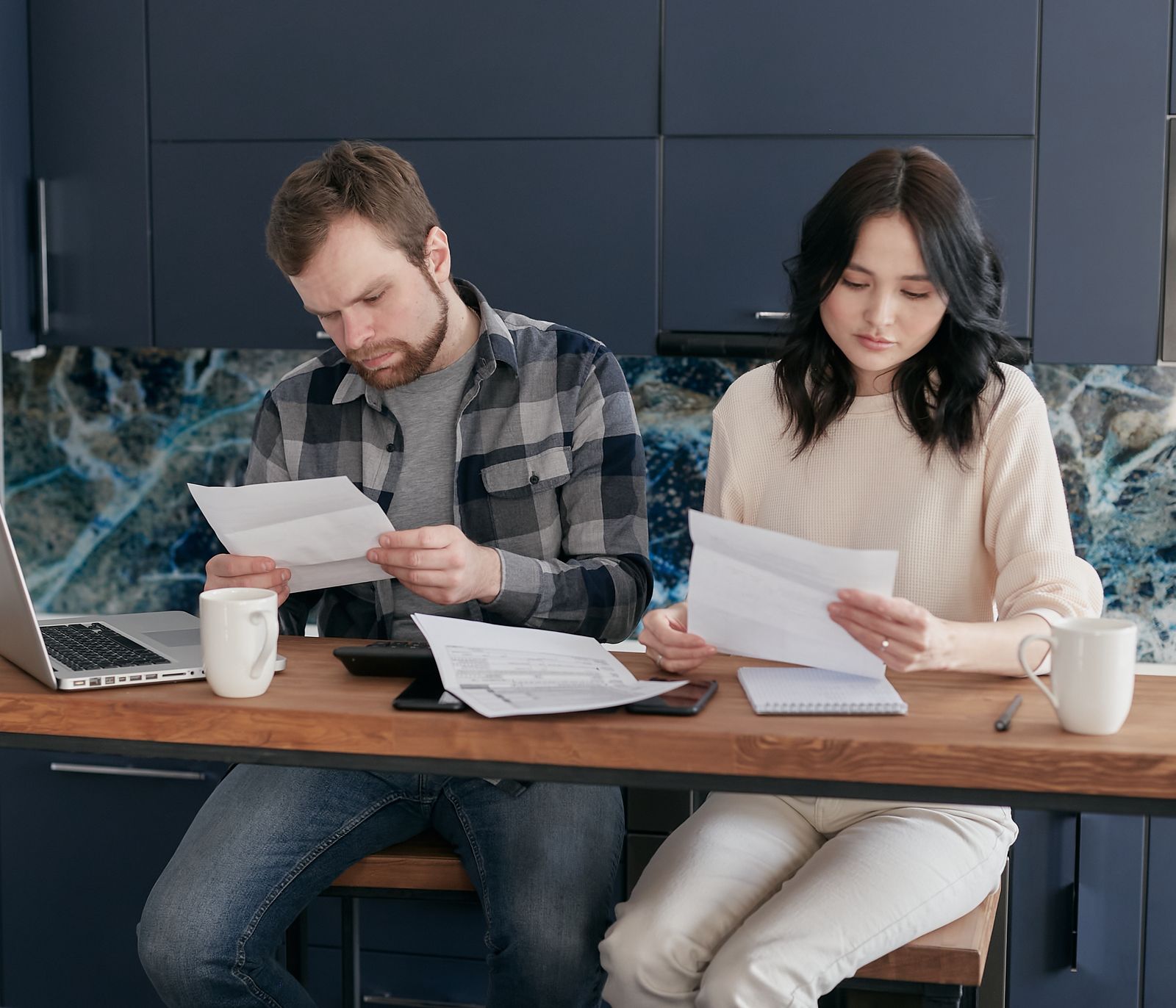 Household reviewing year end financial planning documents